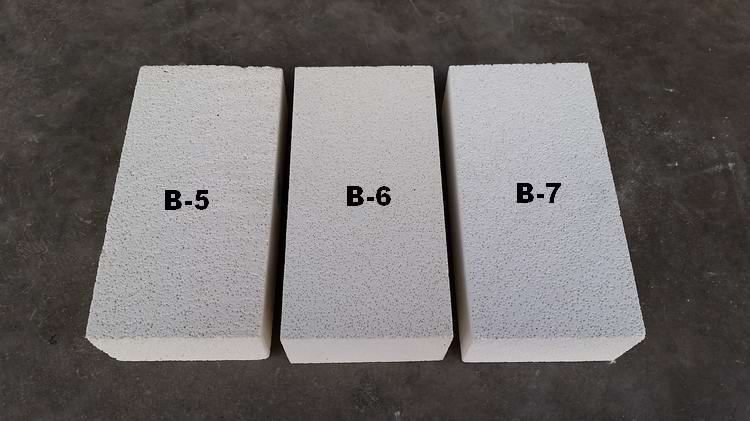 Insulating refractory brick