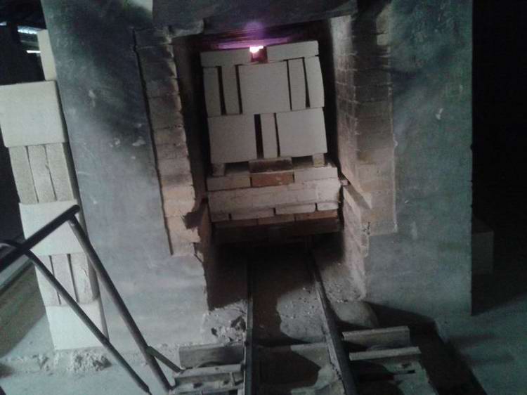 Heat insulating brick